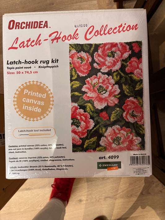 Rya kit med rosa blomster
